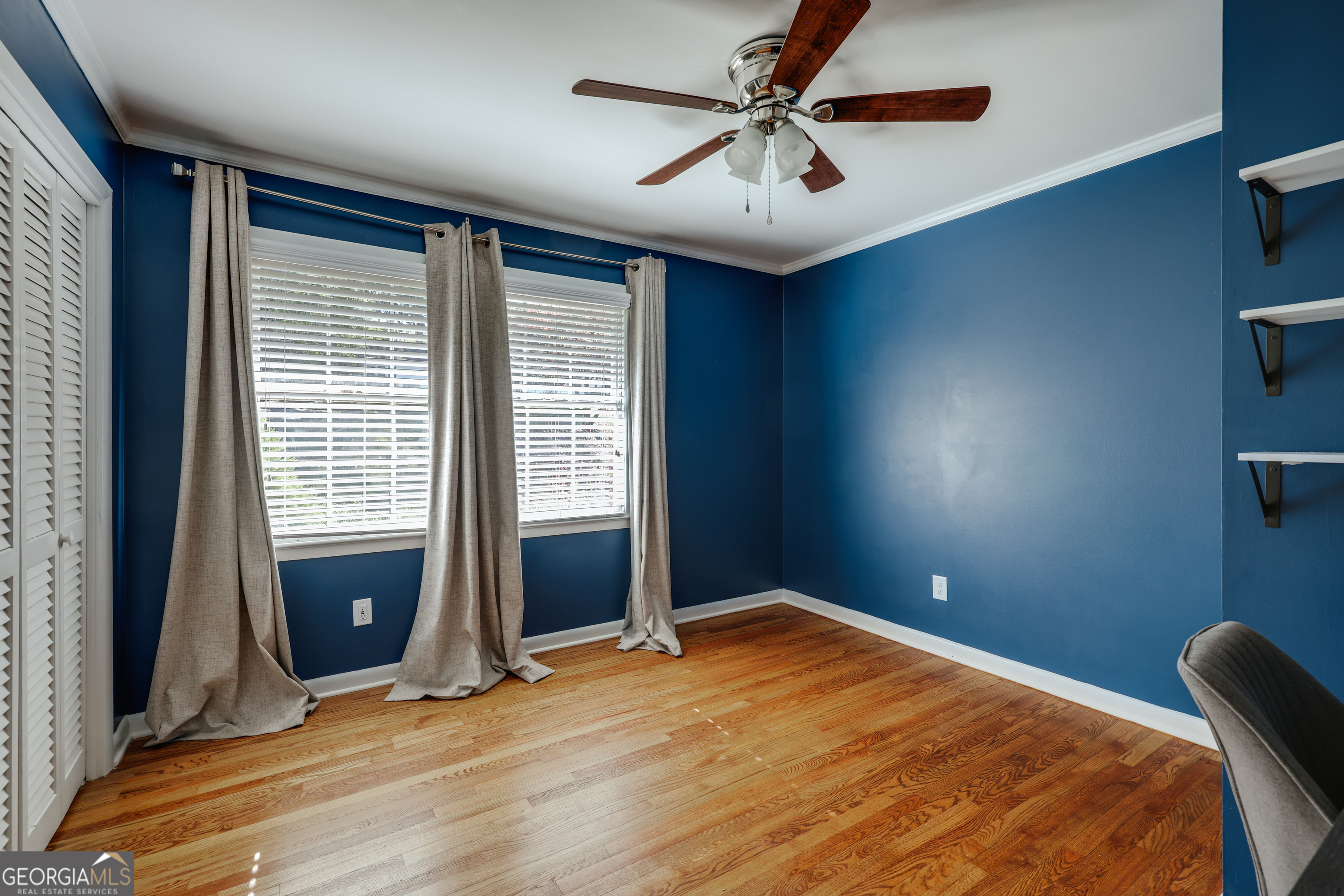 206 Fortson Drive Athens, GA 30606 - Photo 30 of 48 a view of a livingroom with a ceiling fan and window