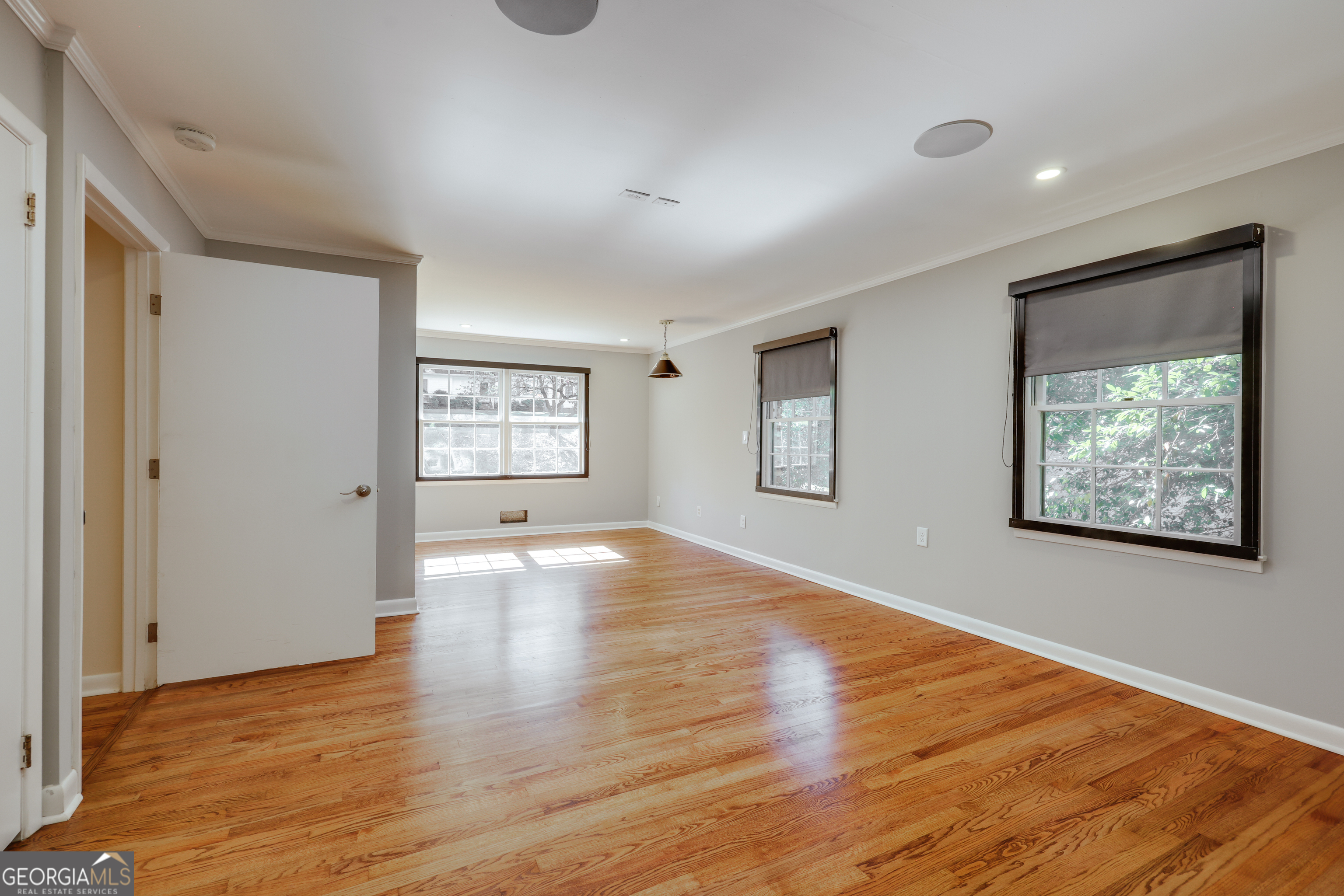 206 Fortson Drive Athens, GA 30606 - Photo 36 of 48 a view of an empty room with wooden floor and a window