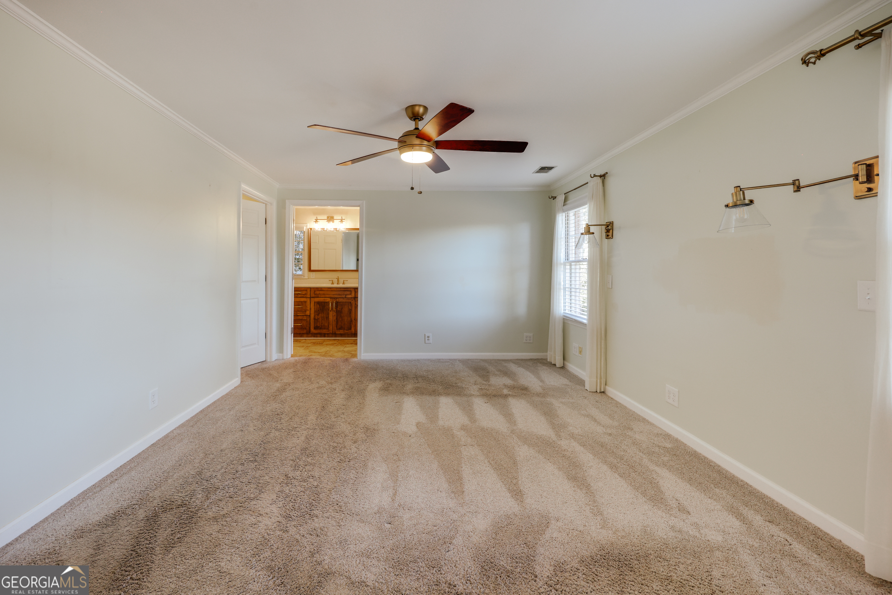 206 Fortson Drive Athens, GA 30606 - Photo 43 of 54 a view of a kitchen with a sink and a chandelier fan
