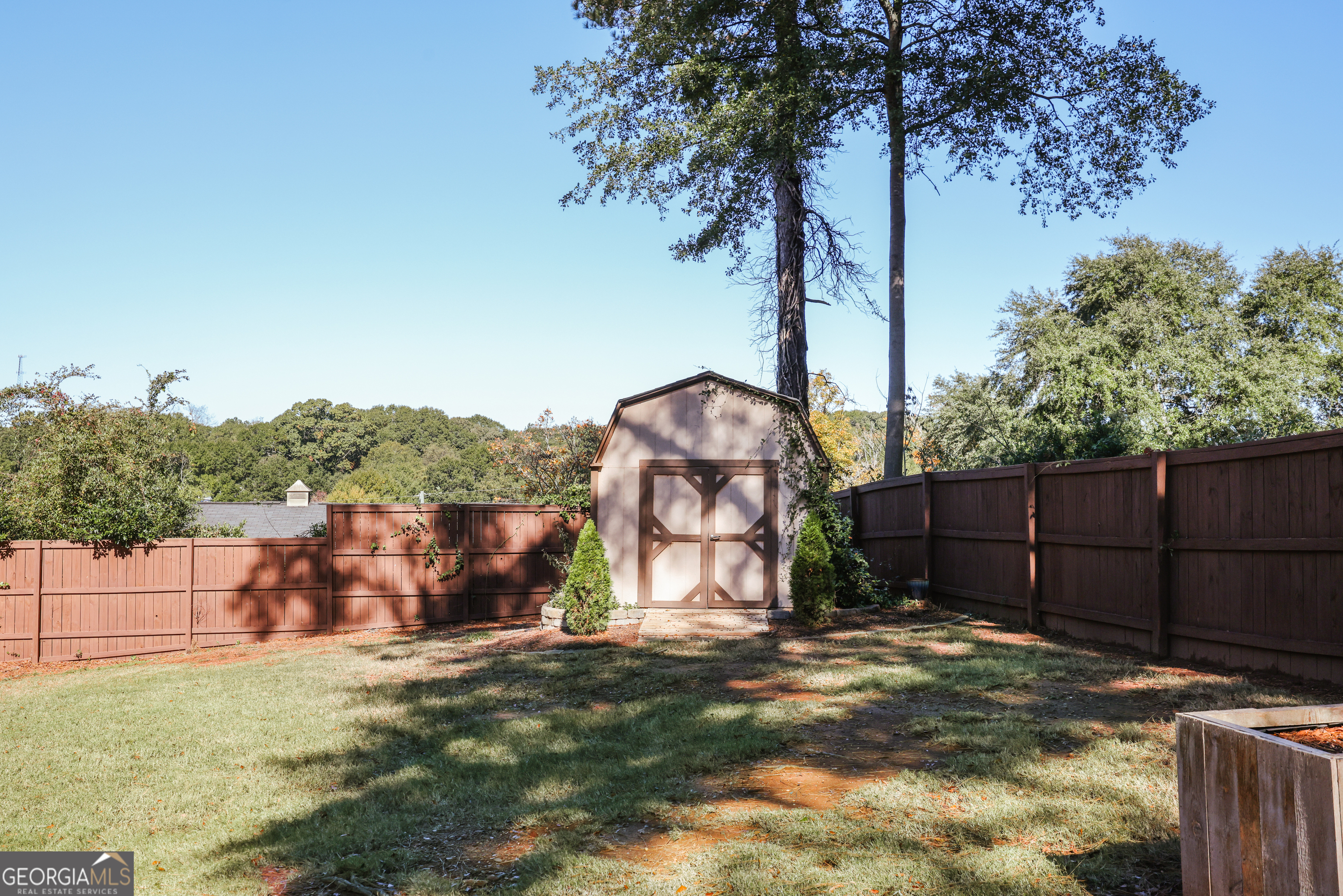206 Fortson Drive Athens, GA 30606 - Photo 44 of 48 a backyard of a house with lots of green space