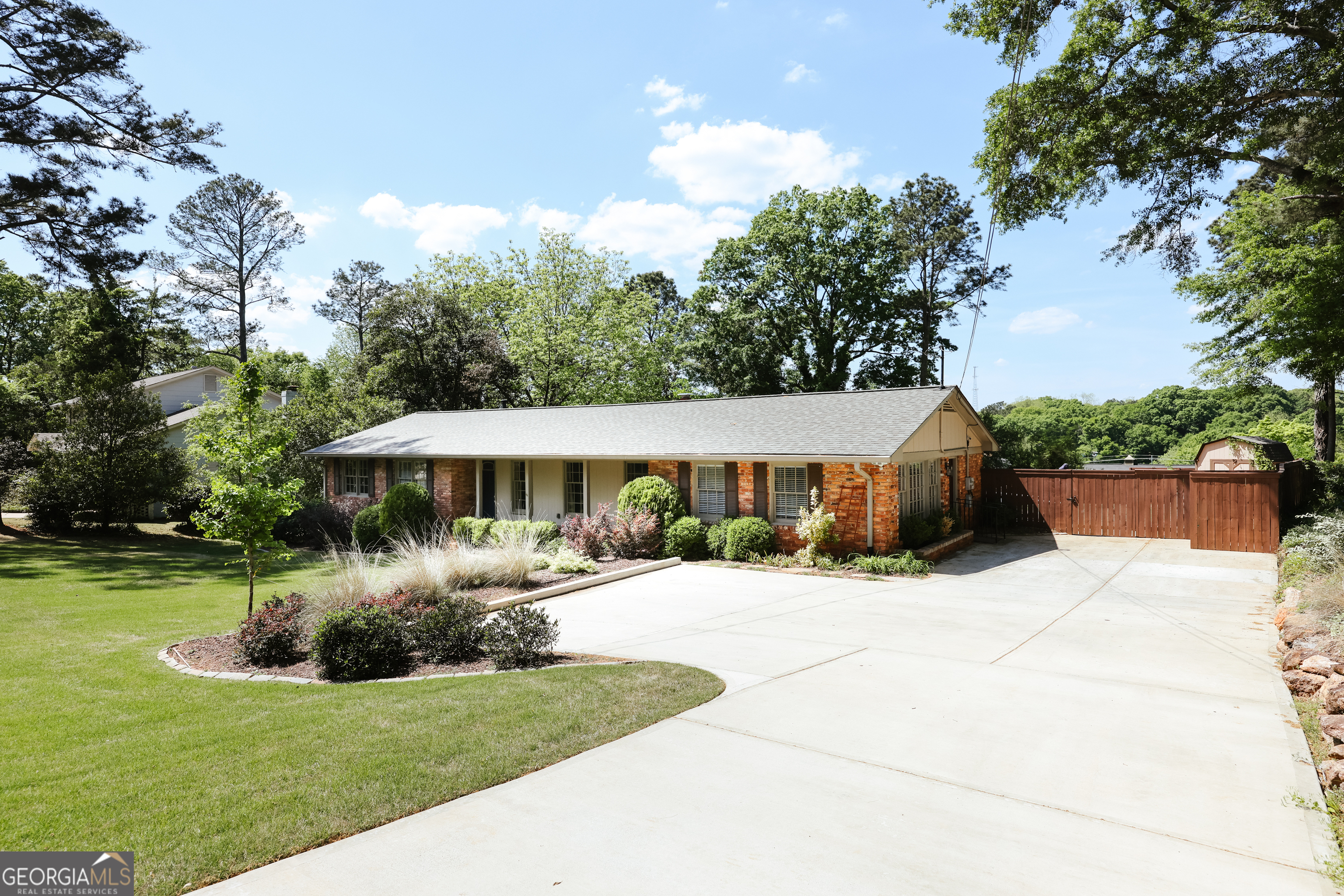206 Fortson Drive Athens, GA 30606 - Photo 47 of 48 a front view of a house with a yard and trees