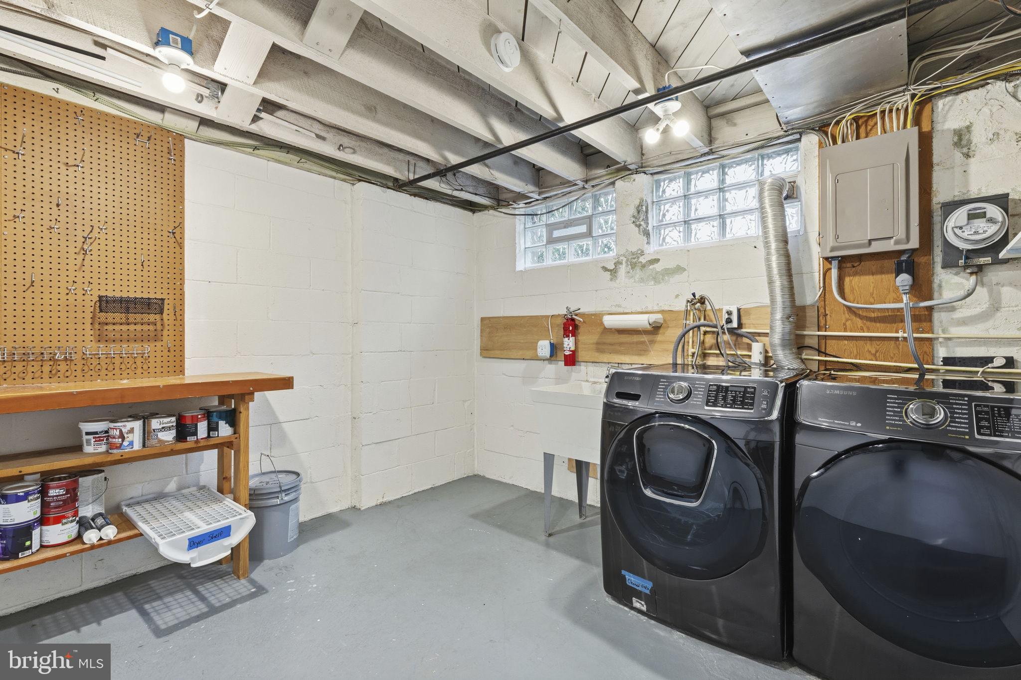 1587 Doxbury Road Towson, MD 21286 - Photo 22 of 31 Functional laundry space with ample storage.