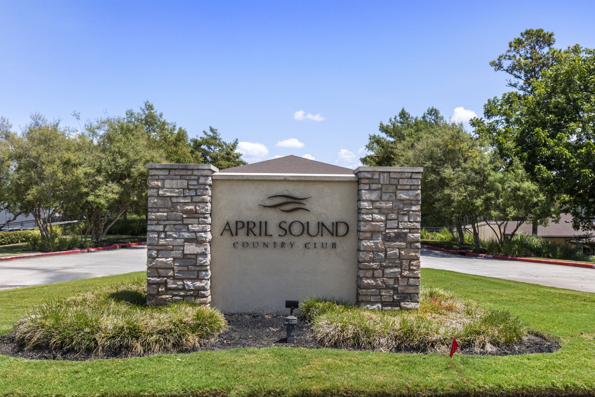 49 April Village Conroe, TX 77356 - Photo 41 of 46 a view of a pathway with a building in the background