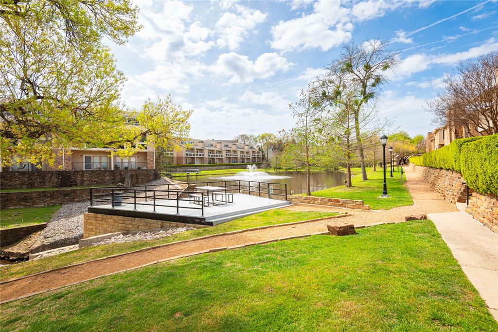 14333 Preston Road, Unit 2807 Dallas, TX 75254 - Photo 29 of 31 View of property's community with a water view and a yard