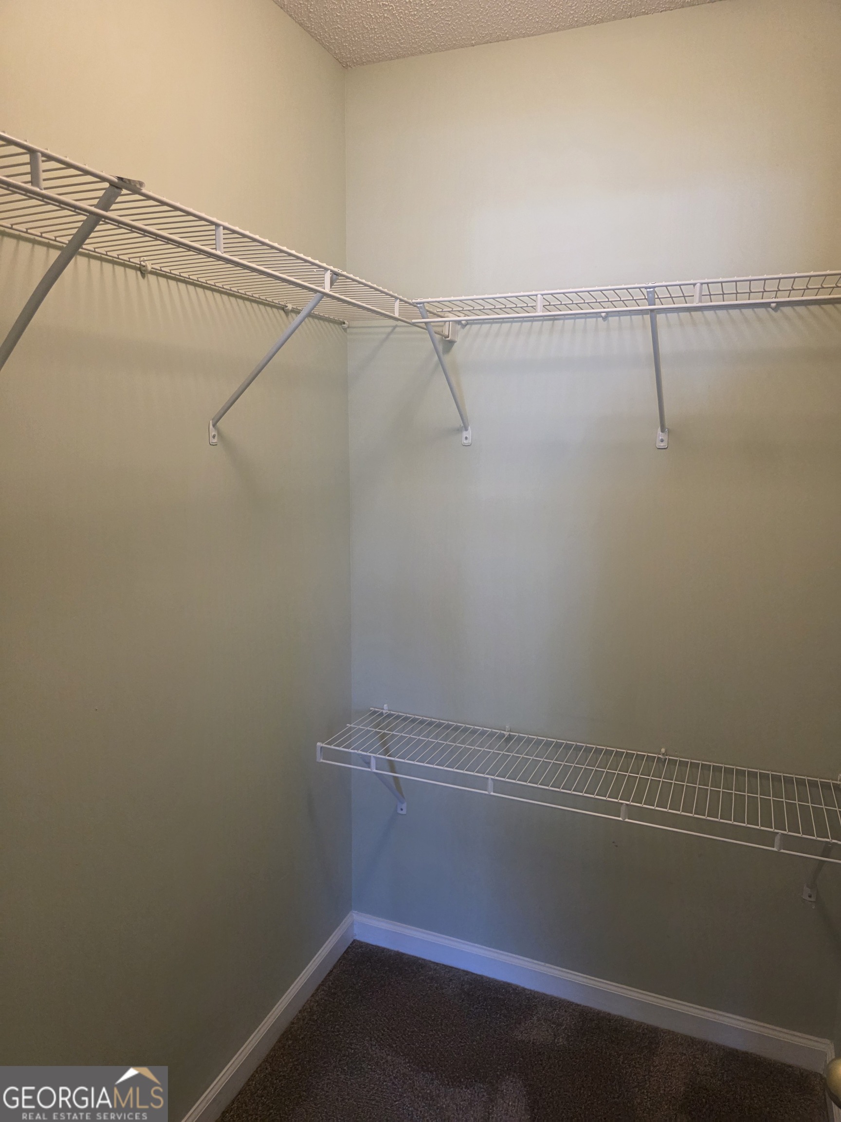 103 Reese Way Rincon, GA 31326 - Photo 12 of 21 a view of a room with racks on the wall