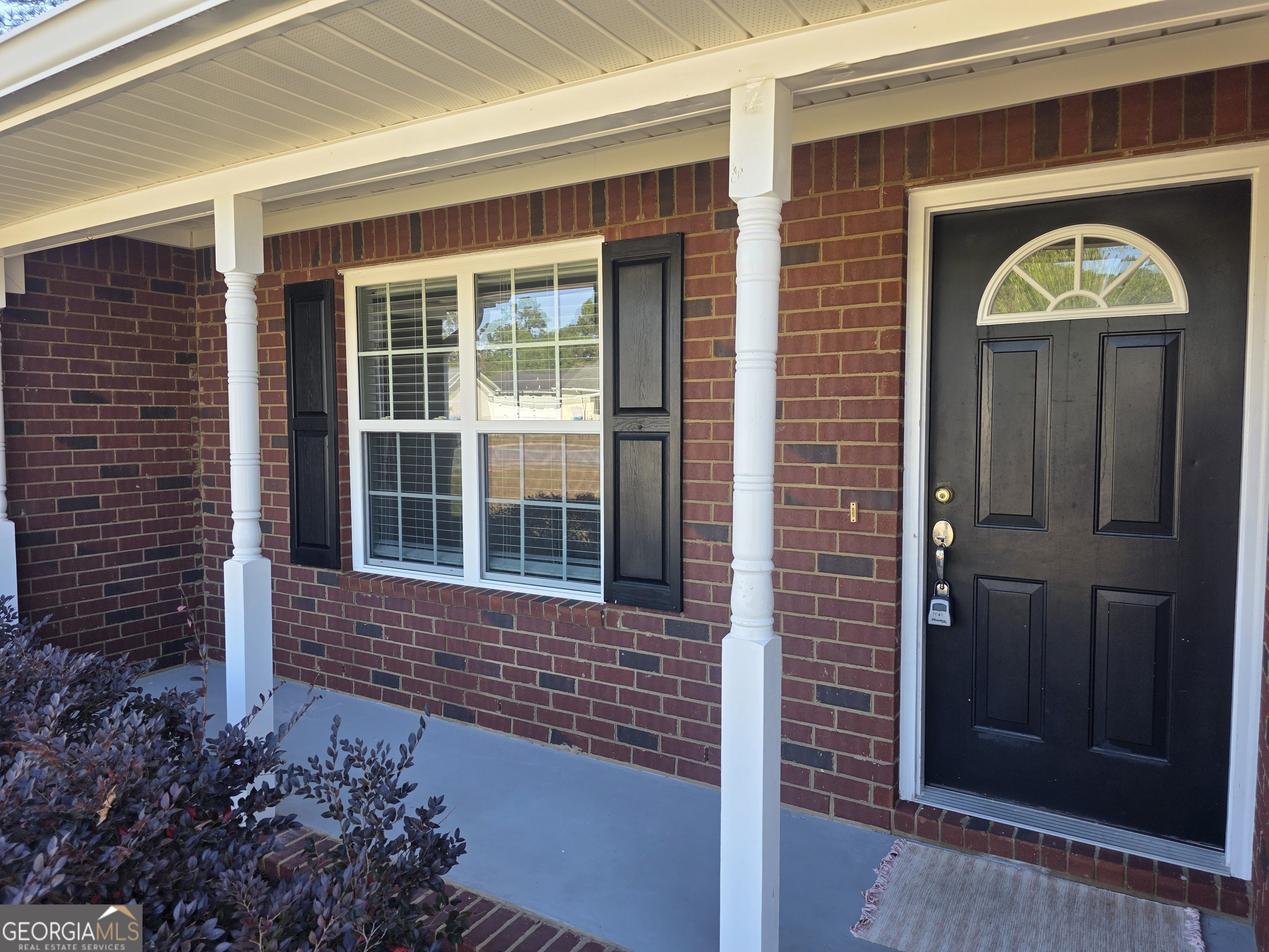 103 Reese Way Rincon, GA 31326 - Photo 2 of 21 a front view of a house with a garden