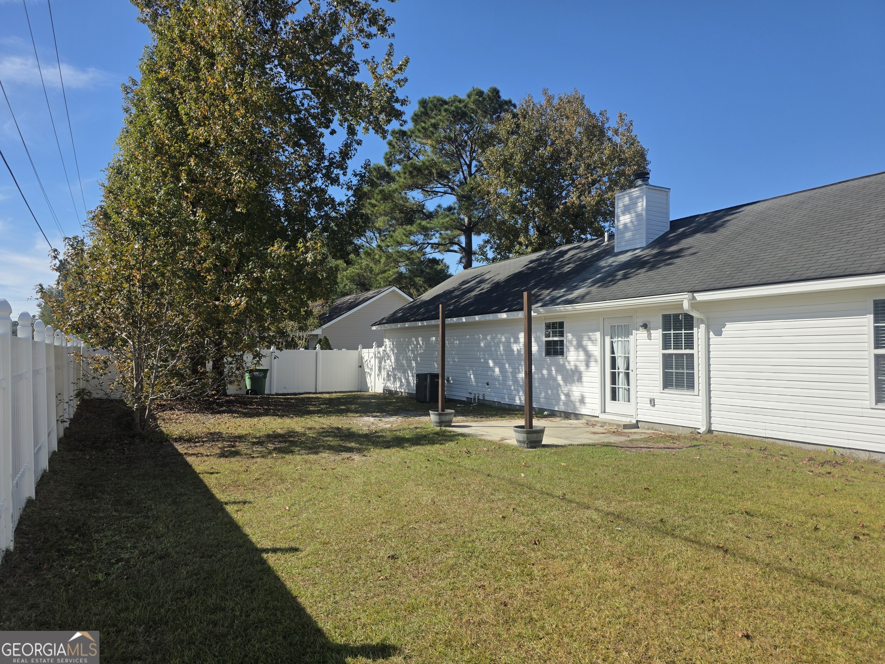 103 Reese Way Rincon, GA 31326 - Photo 21 of 21 a front view of a house with a yard