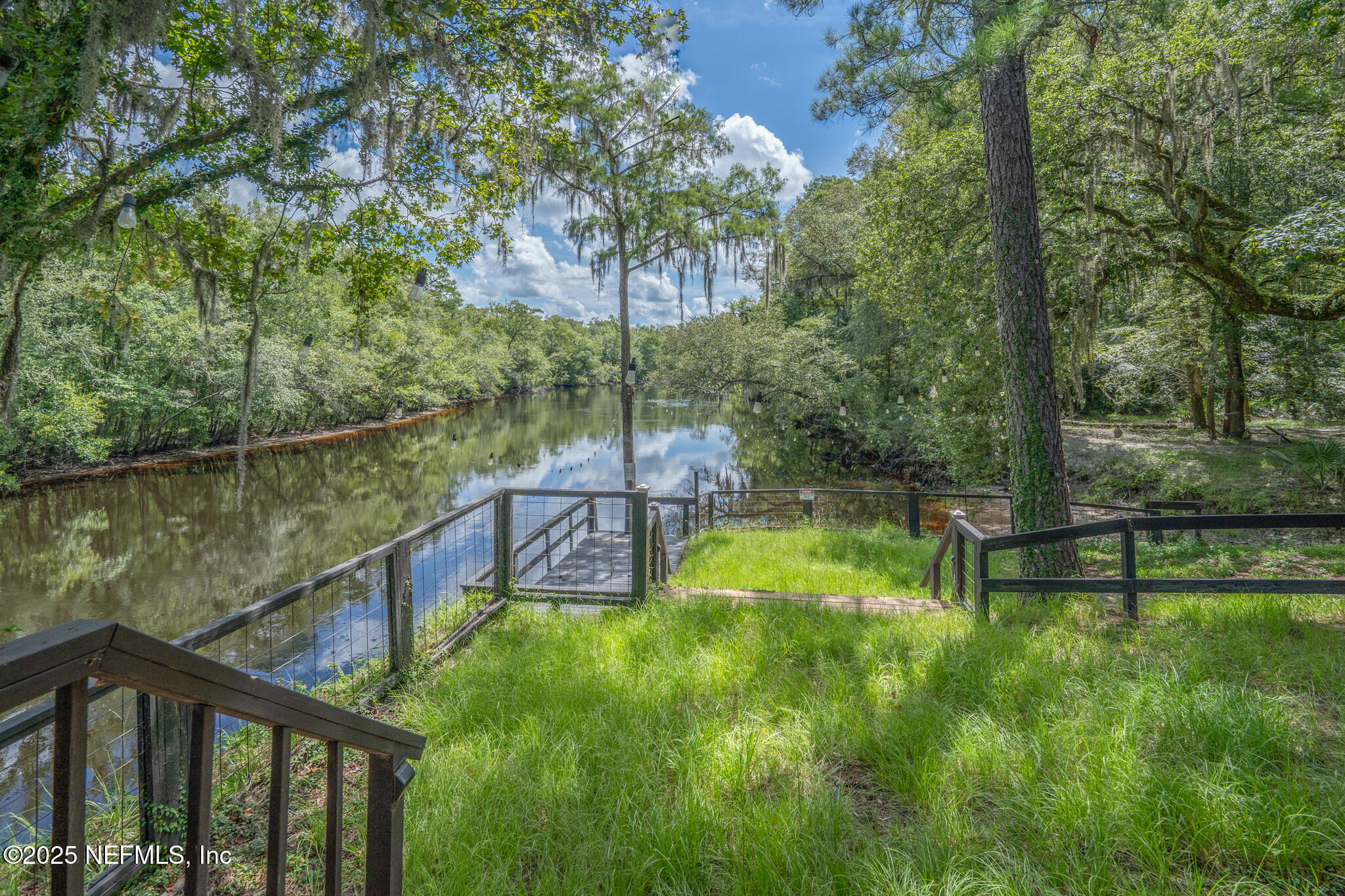 181040 Autumn Road Hilliard, FL 32046 - Photo 15 of 46 a view of a wooden bridge
