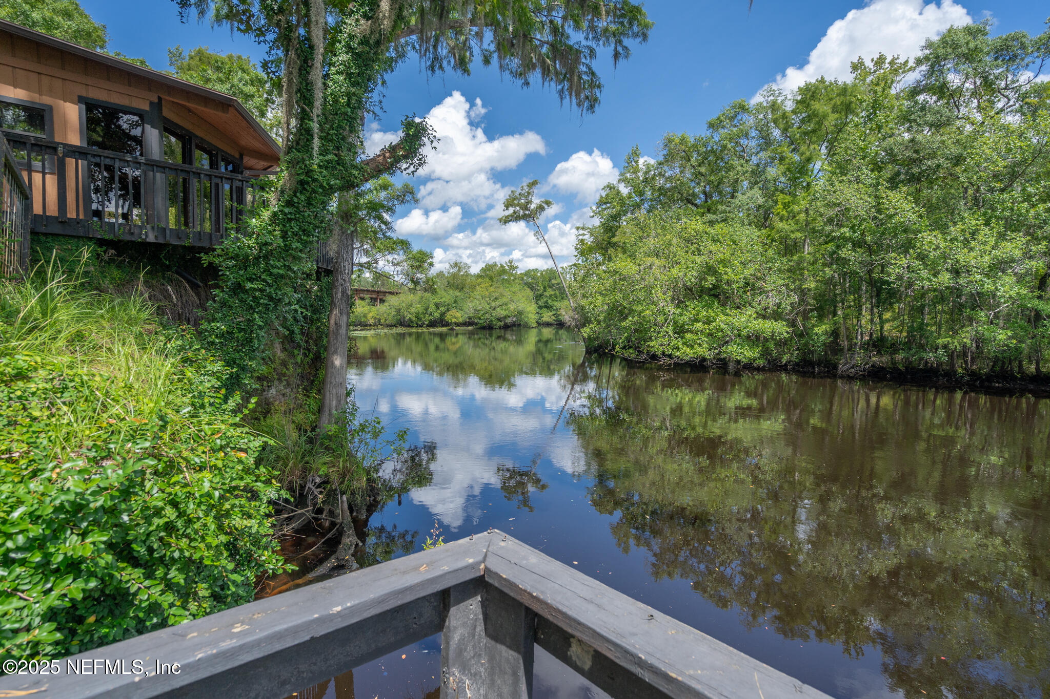 181040 Autumn Road Hilliard, FL 32046 - Photo 16 of 46 a view of a lake from a balcony