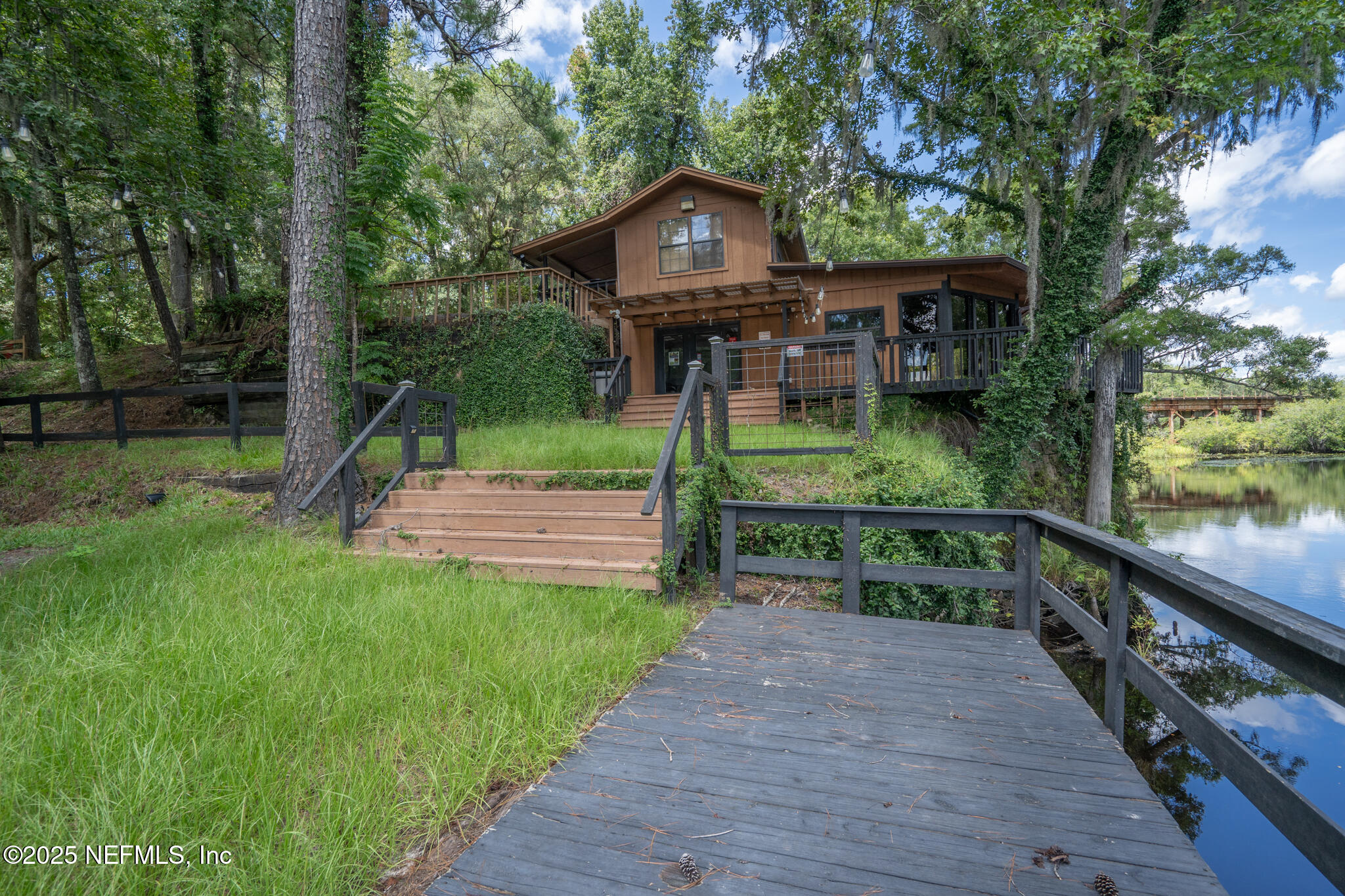 181040 Autumn Road Hilliard, FL 32046 - Photo 18 of 46 a view of house and outdoor space