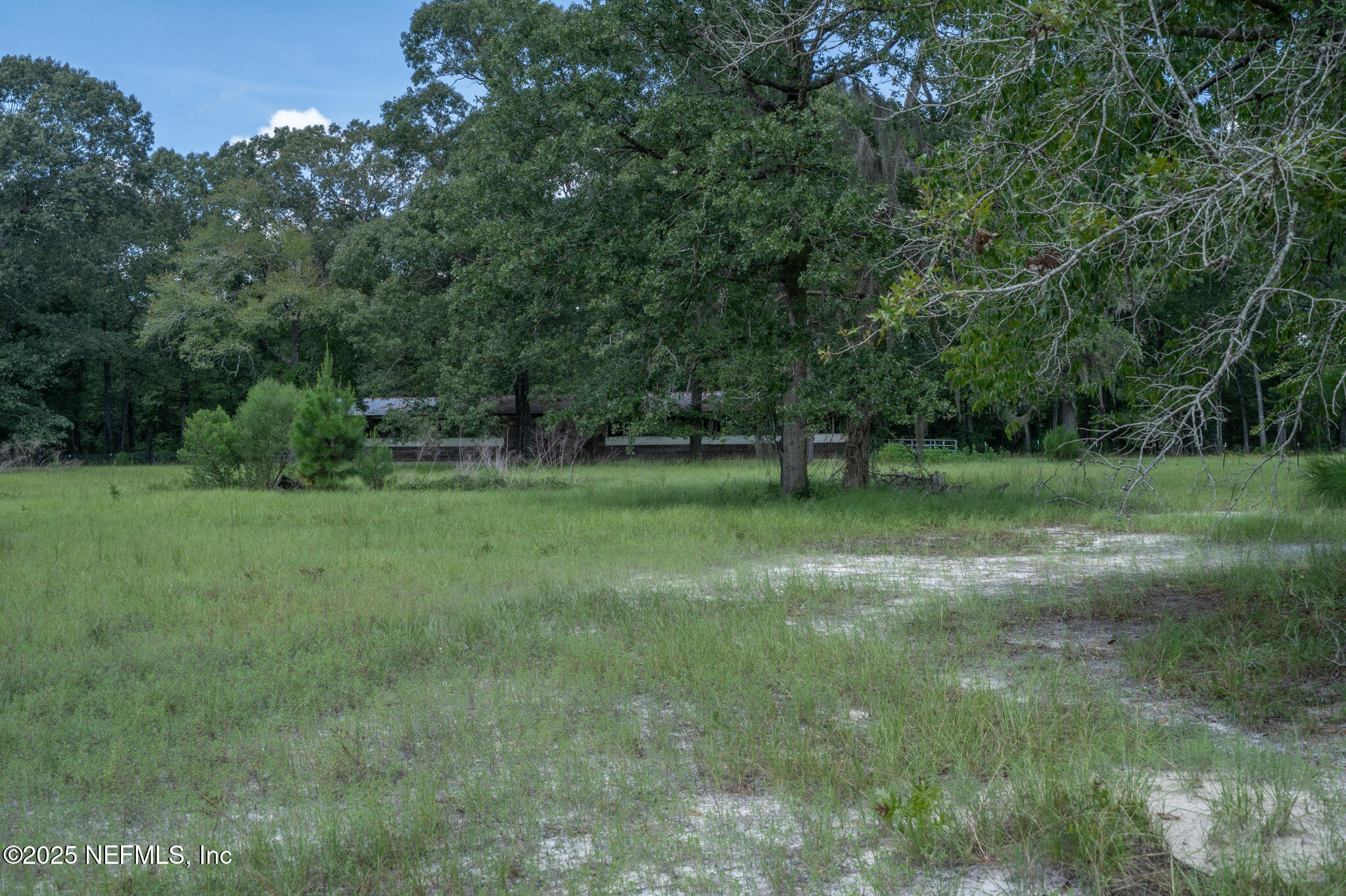 181040 Autumn Road Hilliard, FL 32046 - Photo 36 of 46 a view of outdoor space with deck and yard