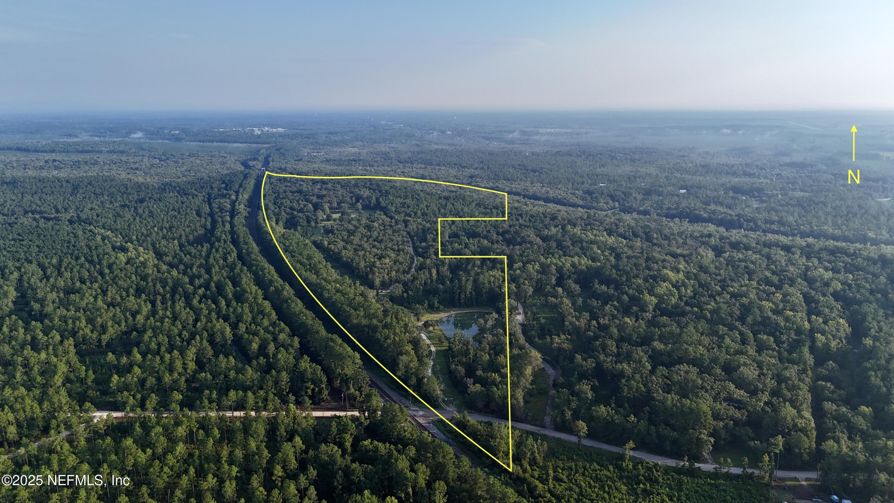 181040 Autumn Road Hilliard, FL 32046 - Photo 43 of 46 a view of a balcony with an outdoor space