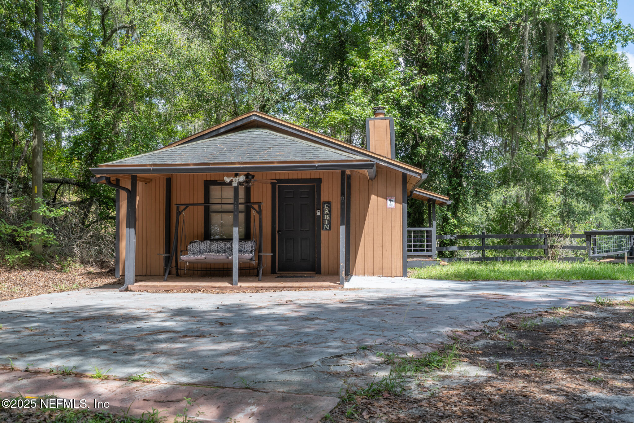 181040 Autumn Road Hilliard, FL 32046 - Photo 9 of 46 a front view of a house with garden