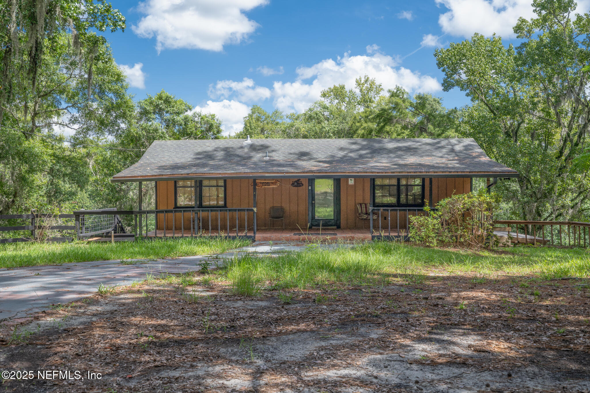 181040 Autumn Road Hilliard, FL 32046 - Photo 10 of 46 a front view of a house with a yard