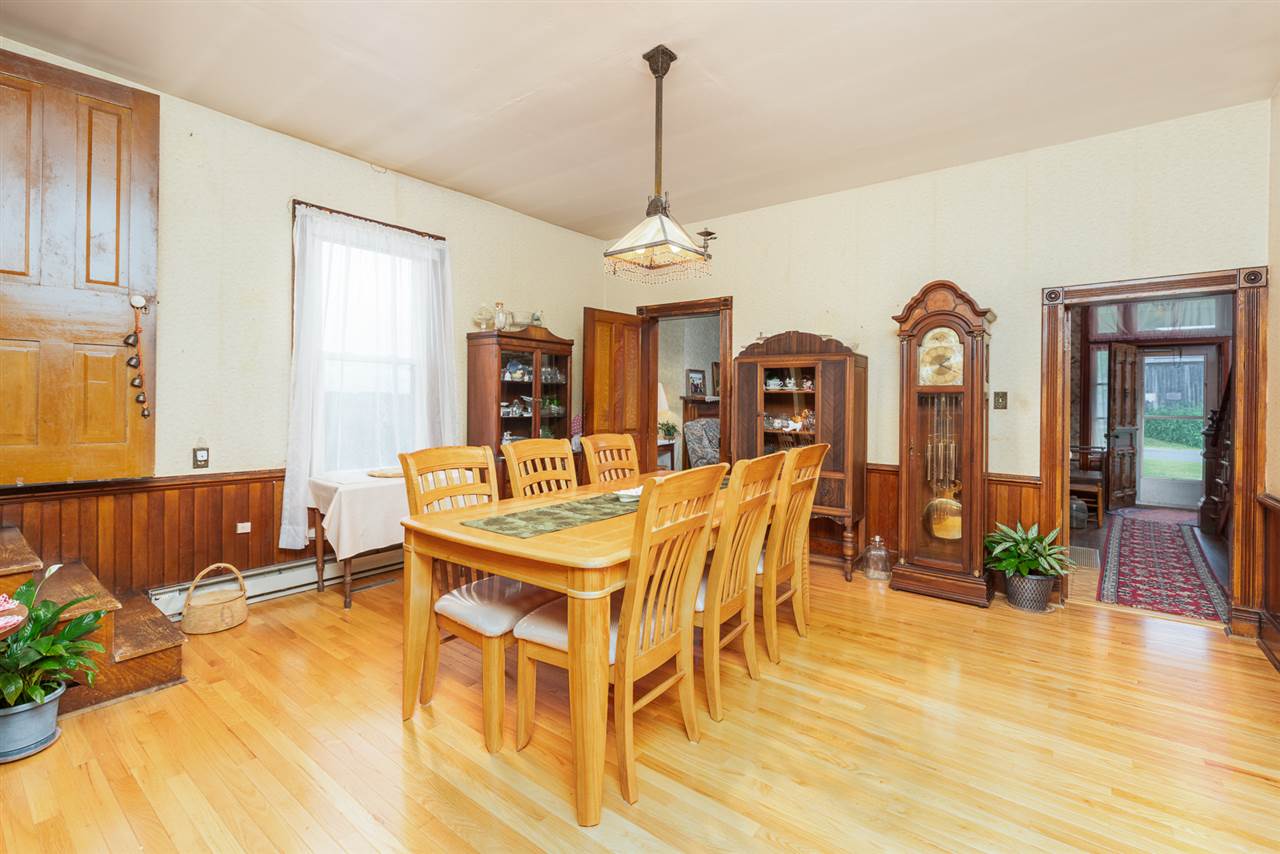 939 Knightly Mill Road Mount Sidney, VA 24467 - Photo 25 of 50 a view of a dining room with furniture and wooden floor