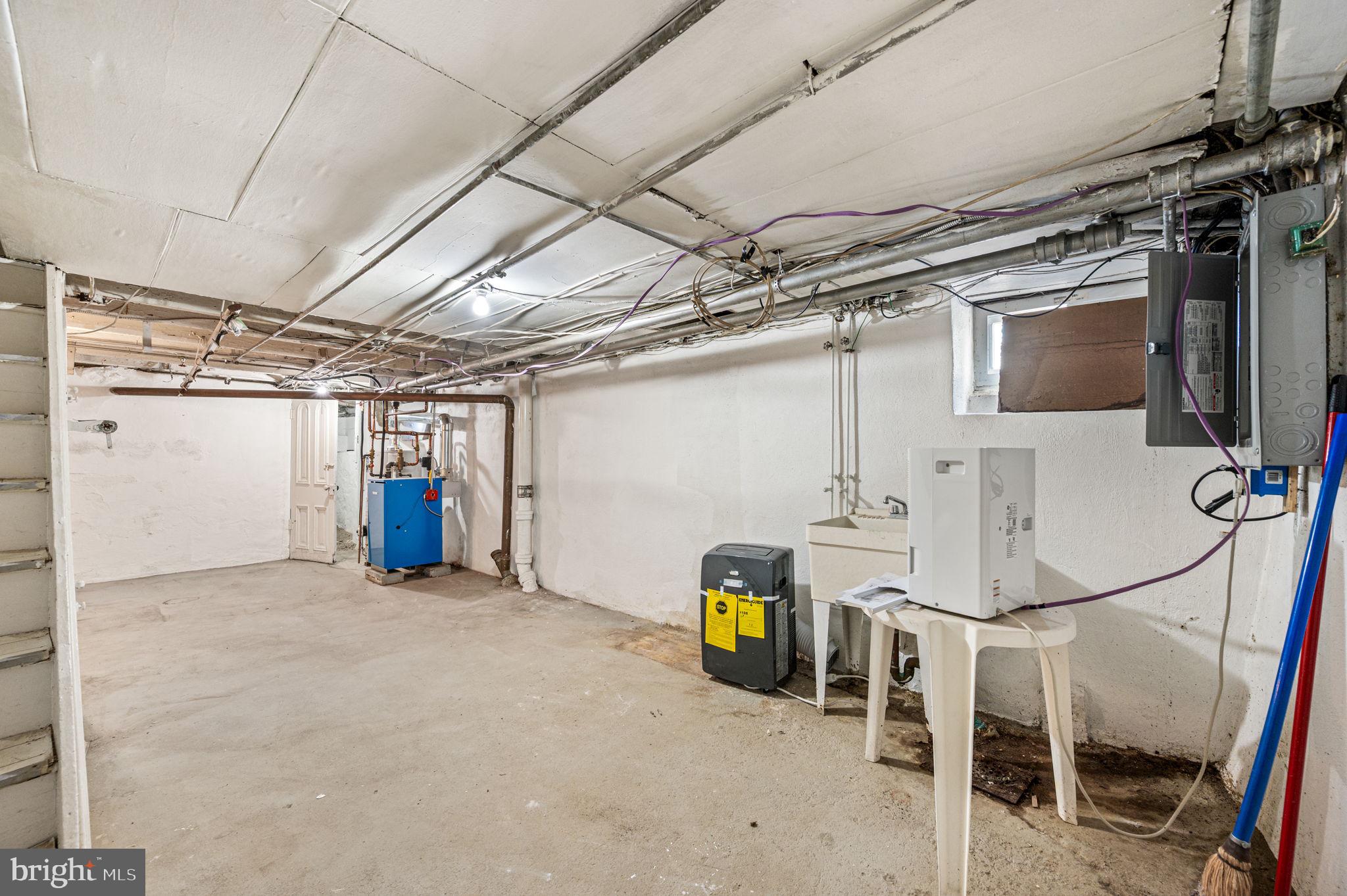 239 Fairview Road Crum Lynne, PA 19022 - Photo 22 of 27 Basement with Storage Room in back