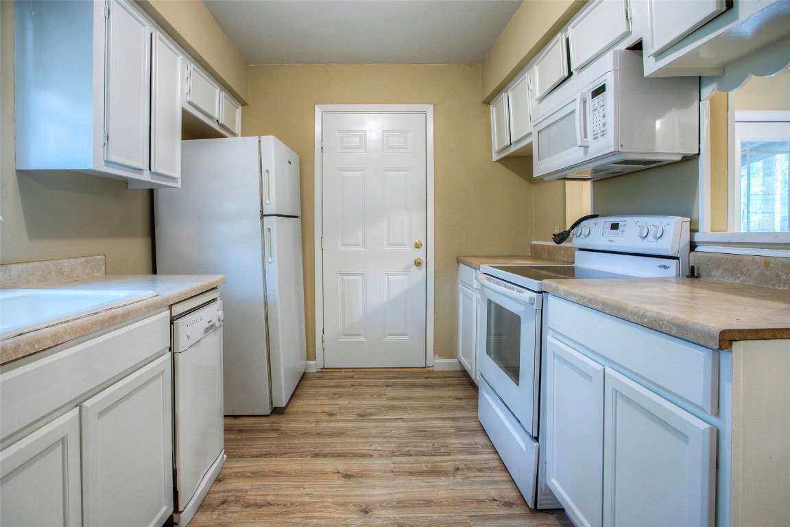 81 Westlake Road Trinity, TX 75862 - Photo 7 of 23 Kitchen facing side exterior door.