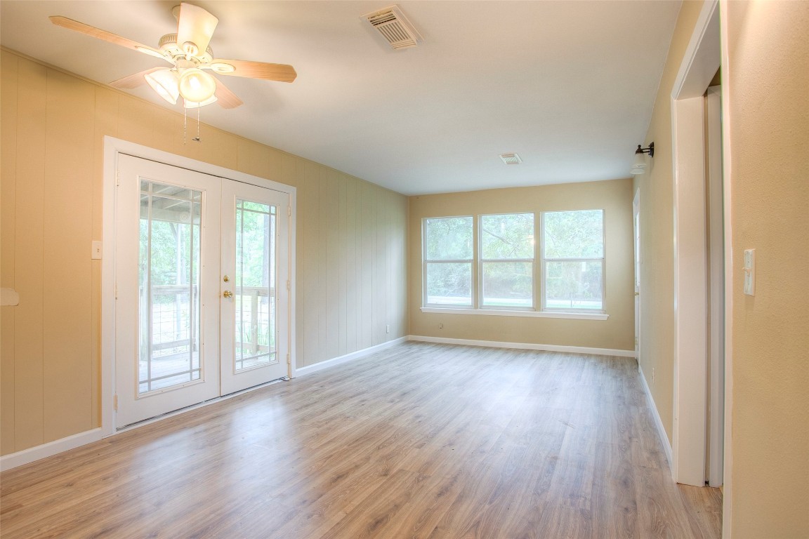 81 Westlake Road Trinity, TX 75862 - Photo 9 of 23 Living room facing side double doors.