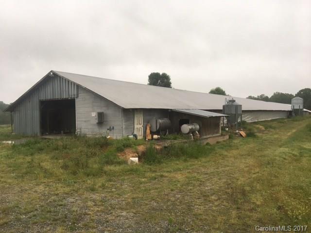 180 Jericho Road Harmony, NC 28634 - Photo 2 of 2 a view of a house with a yard