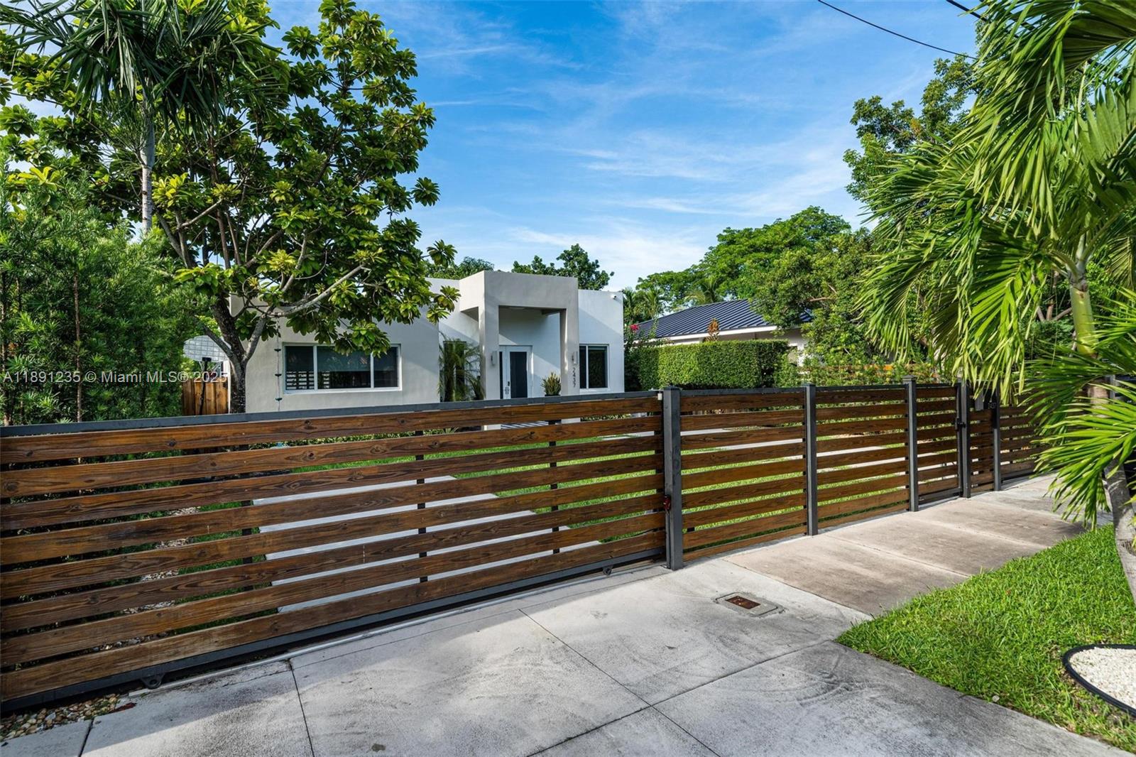 2437 Southwest 25th Terrace Miami, FL 33133 - Photo 2 of 32 a balcony with view of outdoor space