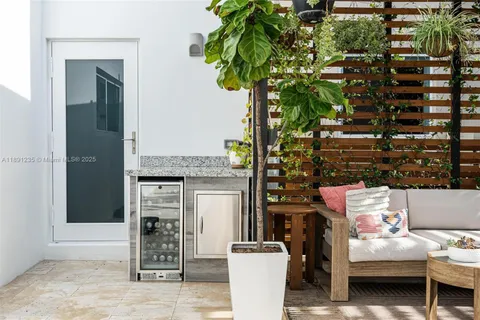 a store room with furniture and a potted plant