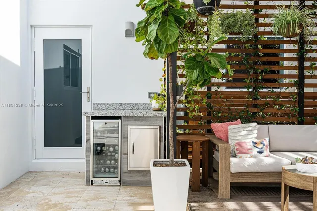 a store room with furniture and a potted plant