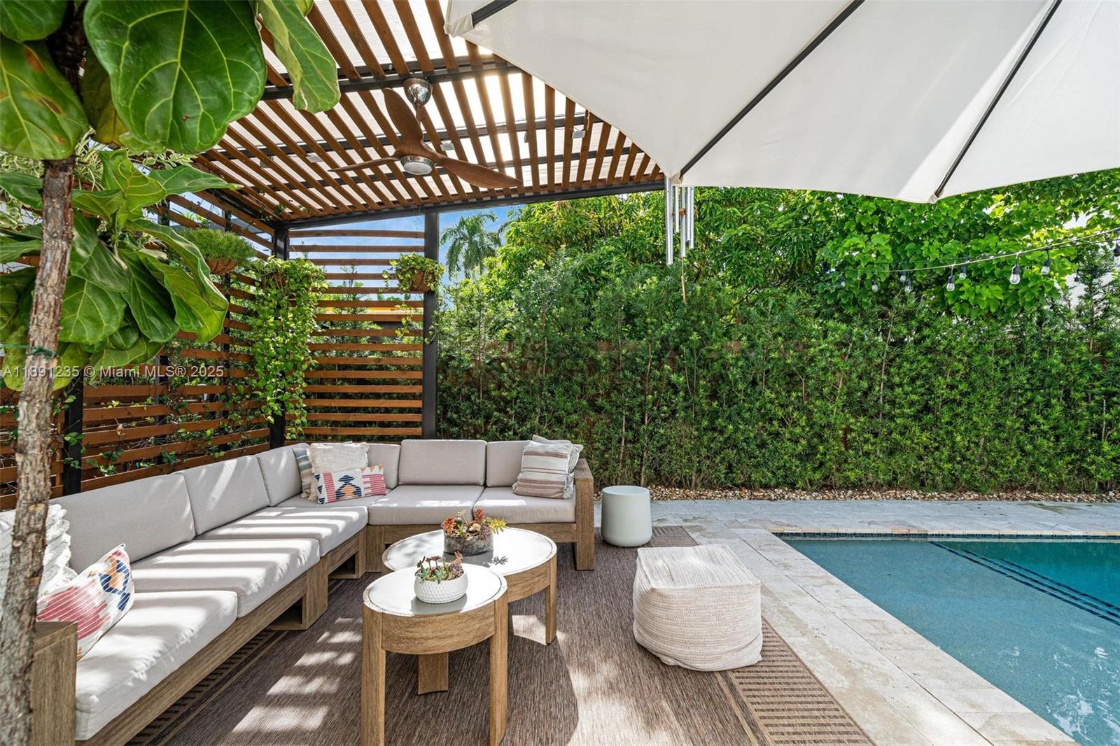 2437 Southwest 25th Terrace Miami, FL 33133 - Photo 29 of 32 a view of a chairs and table in patio