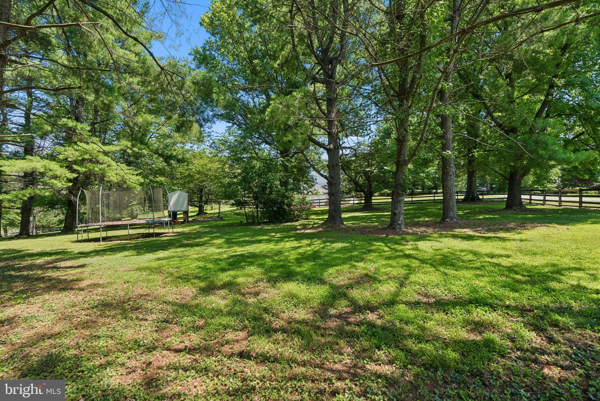 13021 Gent Road Reisterstown, MD 21136 - Photo 37 of 42 Lush green oasis with playful charm.