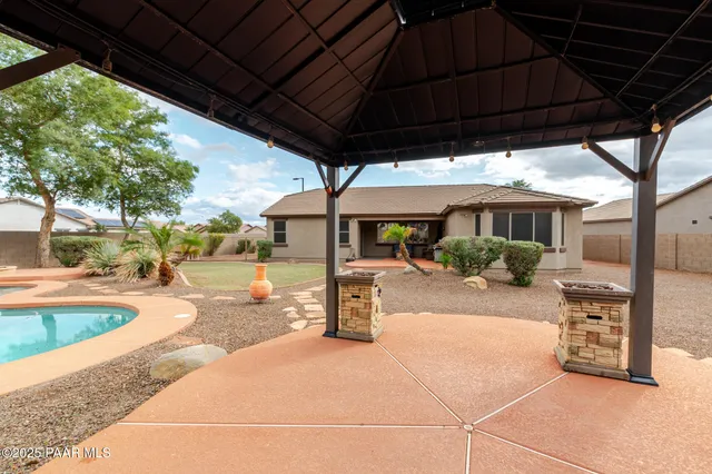 a view of a street with a building in the background