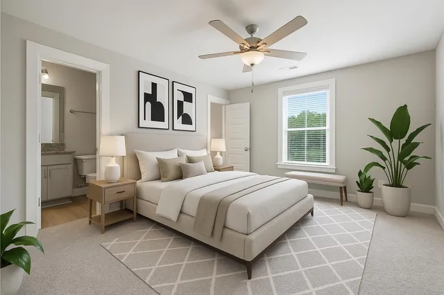 a bedroom with a large bed and a window