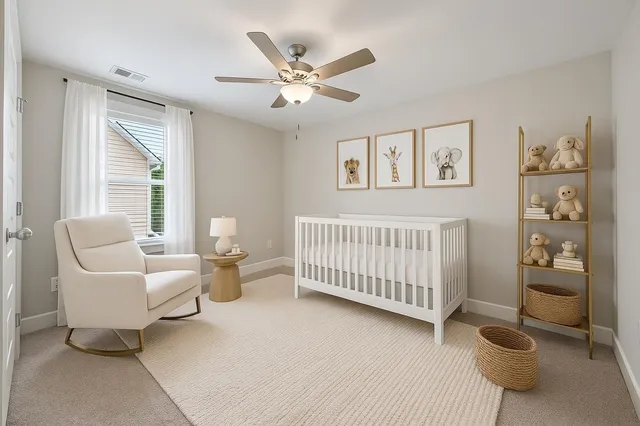 a bedroom with furniture and window