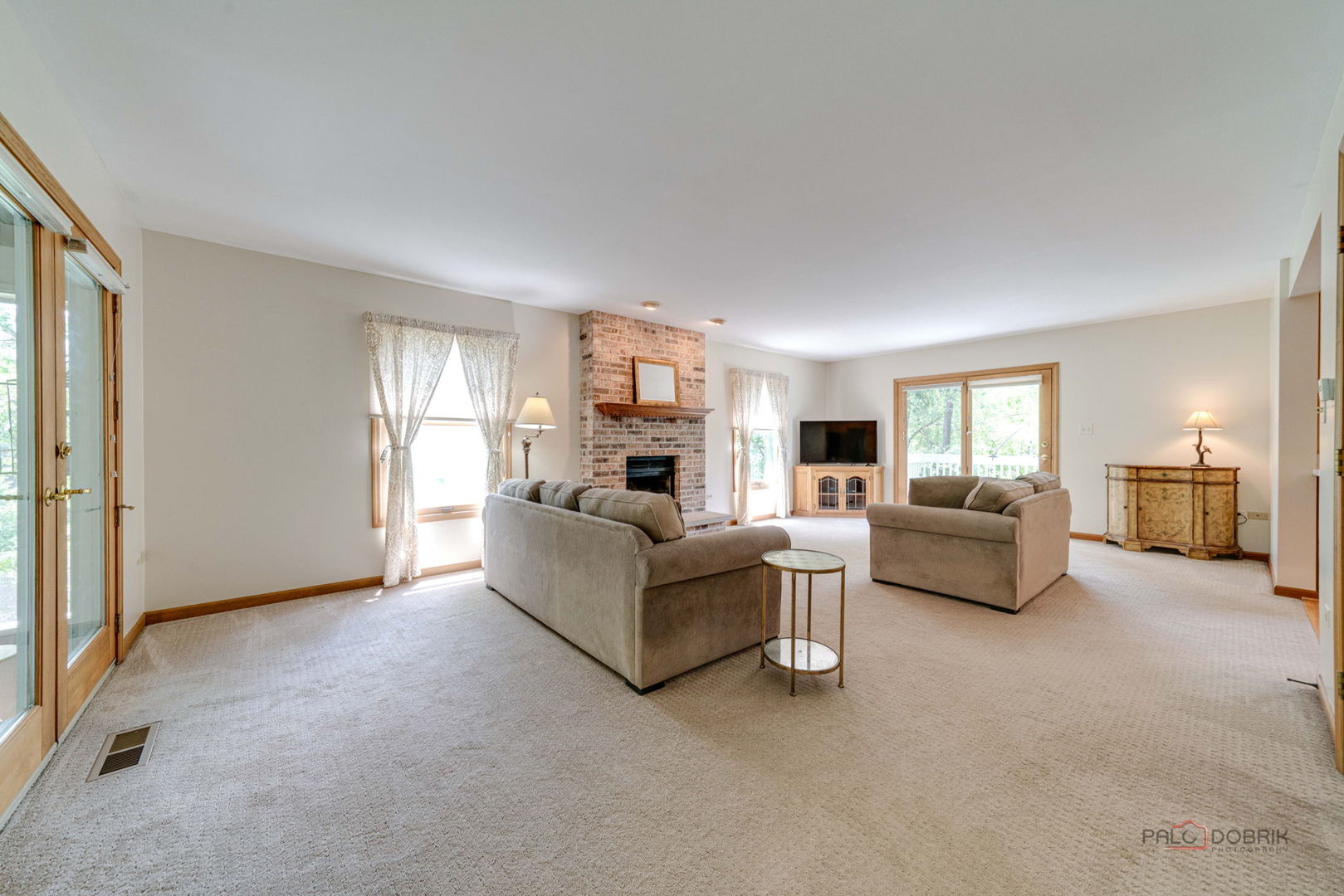 24 Hickory Road Oakwood Hills, IL 60013 - Photo 11 of 35 a living room with furniture and a fireplace