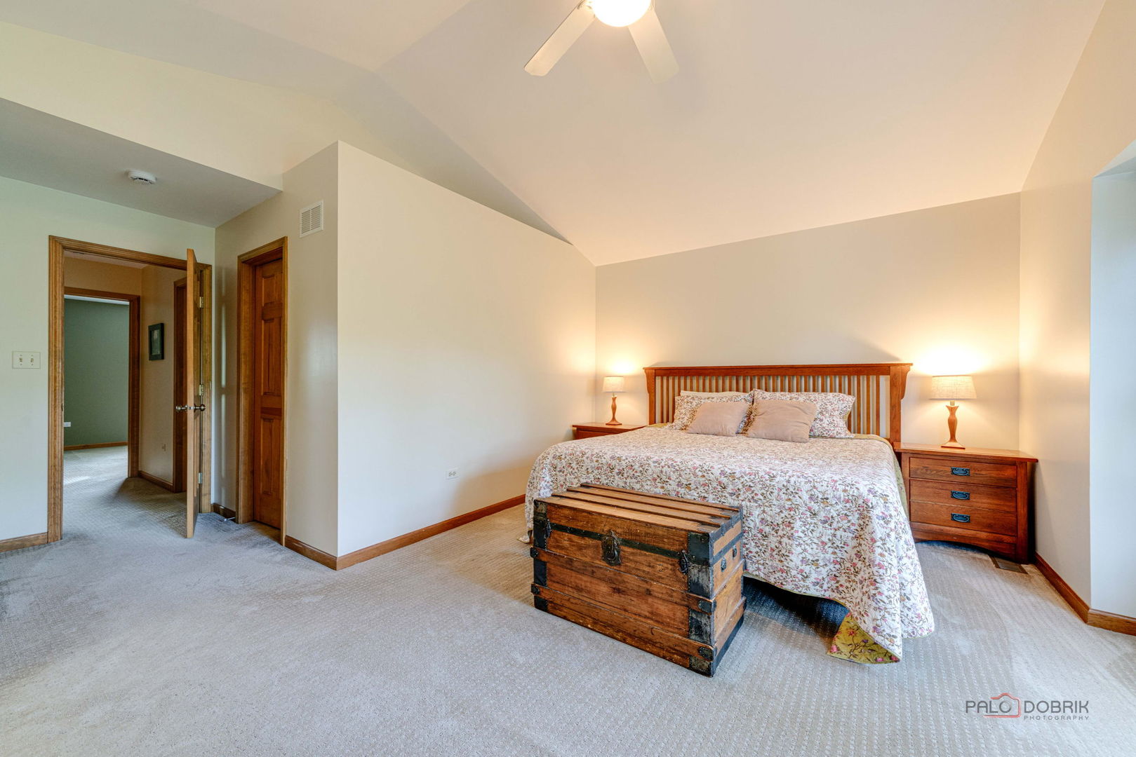 24 Hickory Road Oakwood Hills, IL 60013 - Photo 13 of 35 a bedroom with a bed and a chandelier