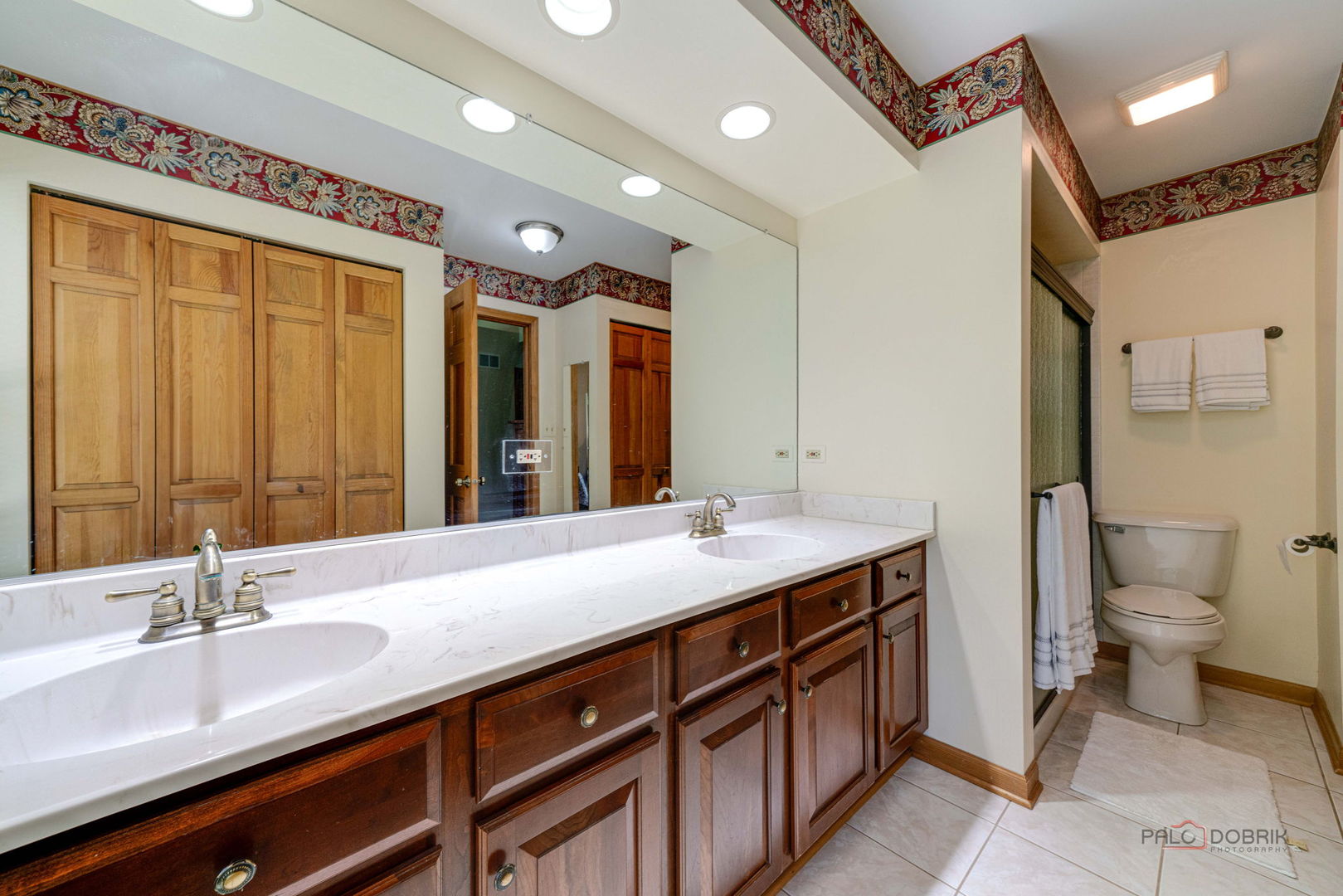 24 Hickory Road Oakwood Hills, IL 60013 - Photo 14 of 35 a bathroom with a double vanity sink mirror and toilet