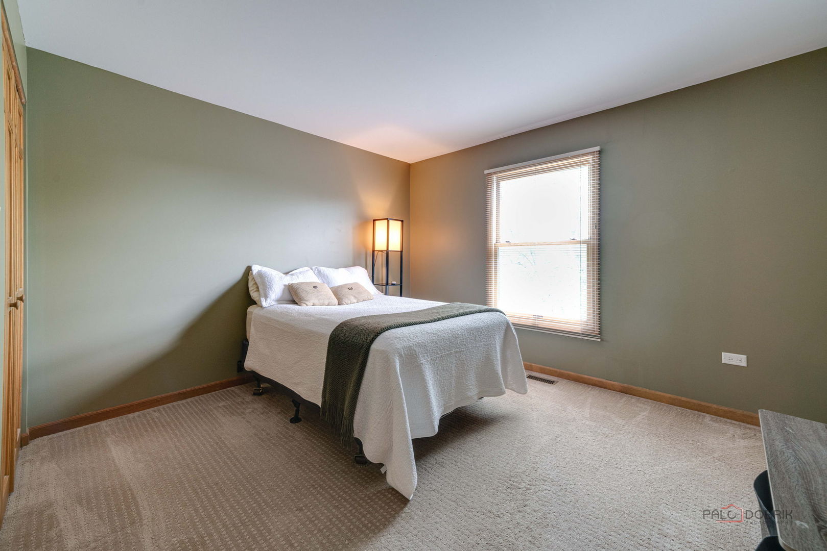 24 Hickory Road Oakwood Hills, IL 60013 - Photo 16 of 35 a spacious bedroom with a bed and a window
