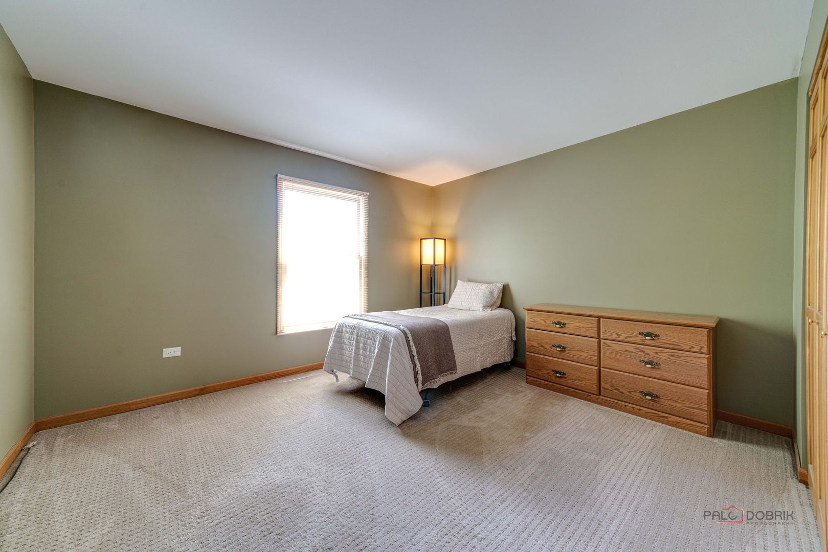 24 Hickory Road Oakwood Hills, IL 60013 - Photo 17 of 35 a spacious bedroom with a bed and window