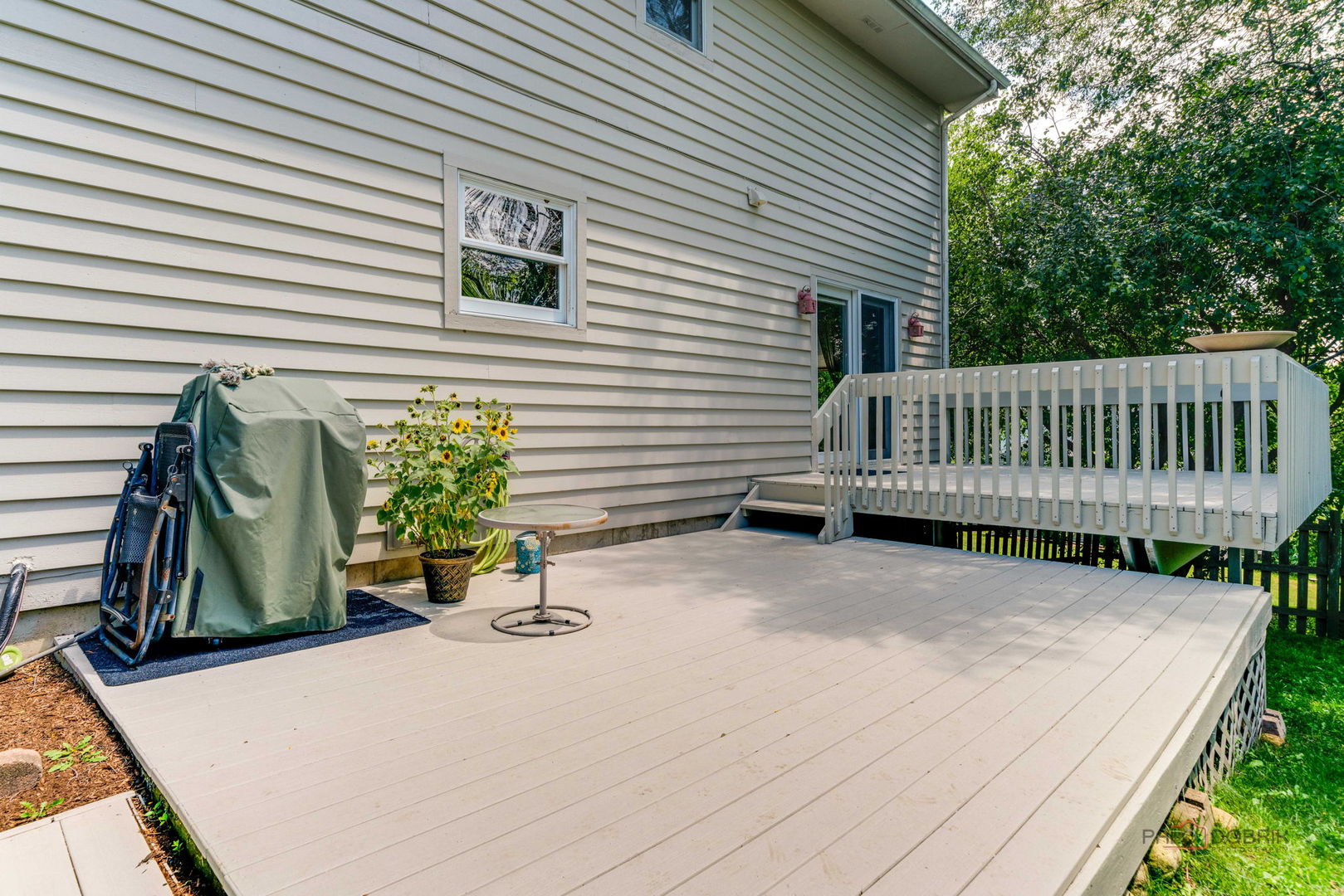 24 Hickory Road Oakwood Hills, IL 60013 - Photo 28 of 35 a view of backyard with a deck