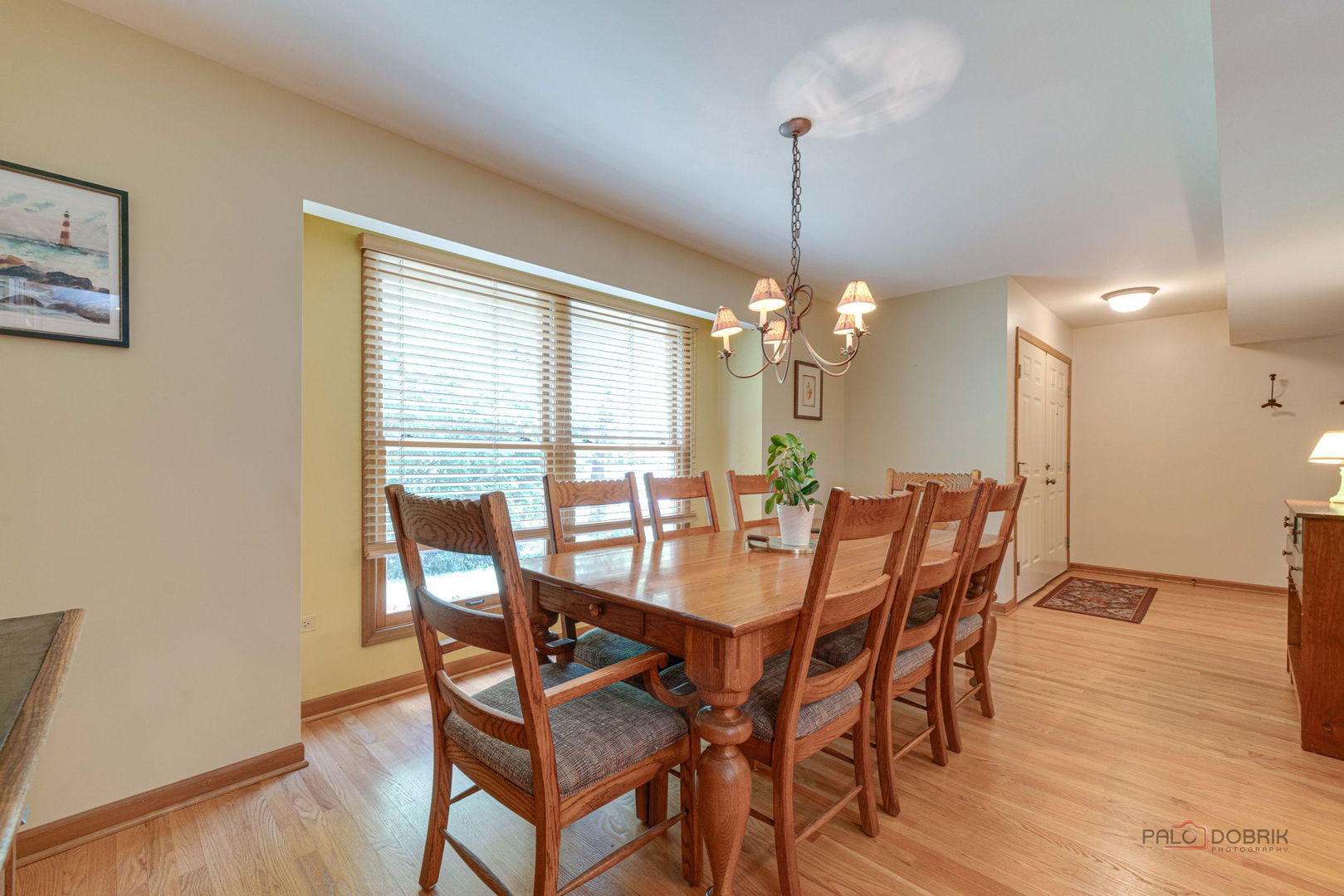 24 Hickory Road Oakwood Hills, IL 60013 - Photo 5 of 35 a view of a dining room with furniture window and wooden floor