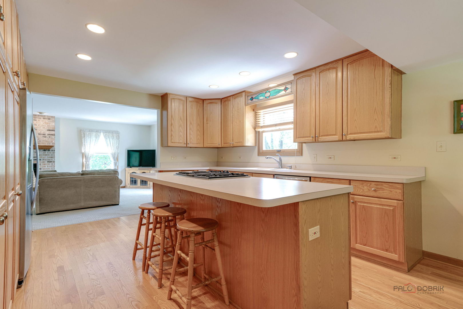 24 Hickory Road Oakwood Hills, IL 60013 - Photo 8 of 35 a kitchen with stainless steel appliances granite countertop a stove a sink and a refrigerator