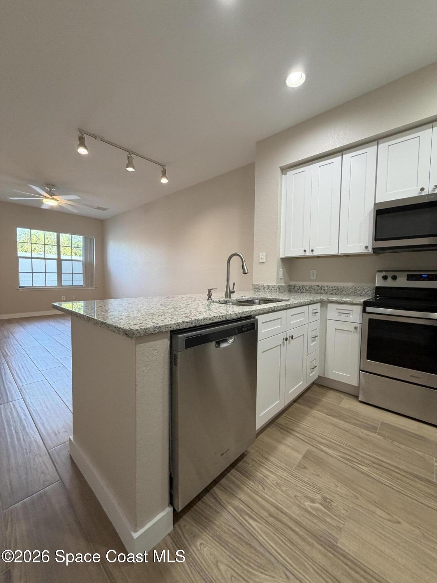 105 Turpial Way, Unit 103 Melbourne, FL 32901 - Photo 3 of 31 IMG_0573