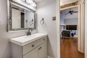 a bathroom with a sink and a mirror