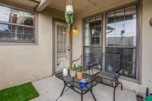a outdoor space with a couch and chairs