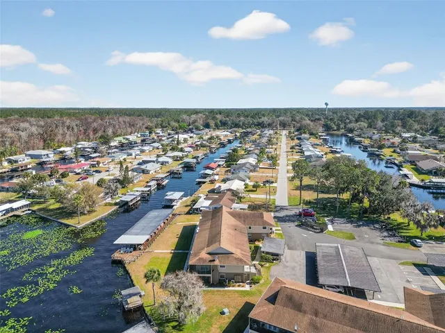 a view of swimming pool with seating space
