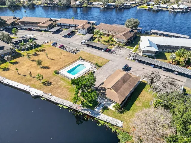 a view of swimming pool with outdoor seating