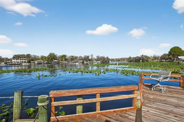 a view of pool with yard