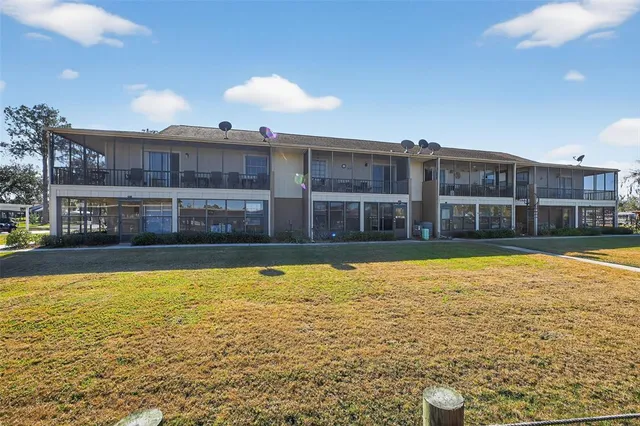 a front view of a building with garden
