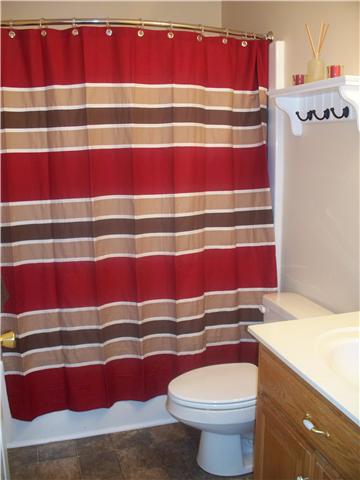 1554 Parker Road Manchester, TN 37355 - Photo 14 of 18 a bathroom with a toilet and a sink