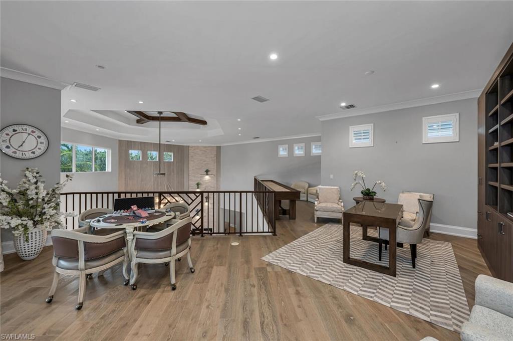 11910 Via Salerno Way Miromar Lakes, FL 33913 - Photo 27 of 50 a view of a dining room with furniture and wooden floor
