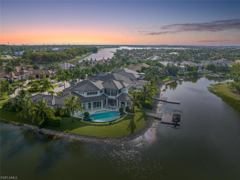 11910 Via Salerno Way Miromar Lakes, FL 33913 - Photo 39 of 50 a view of a lake in middle of the town