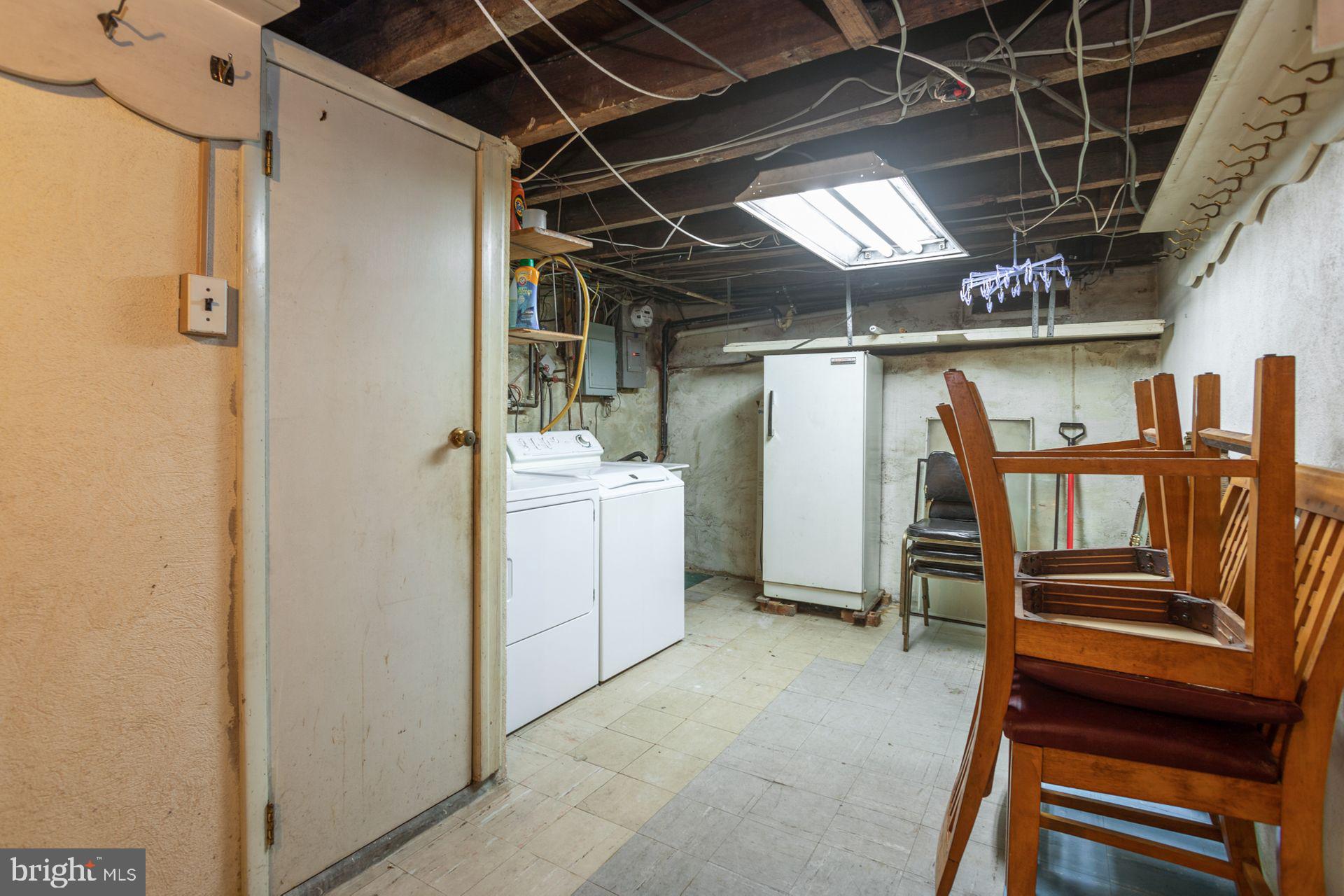 723 Tasker Street Philadelphia, PA 19148 - Photo 16 of 33 Laundry room with Storage, Vintage Wine Cellar
